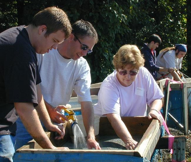 Professor Marjorie Jones and four students from the University of Southern Indiana volunteering their time to help with water-screening