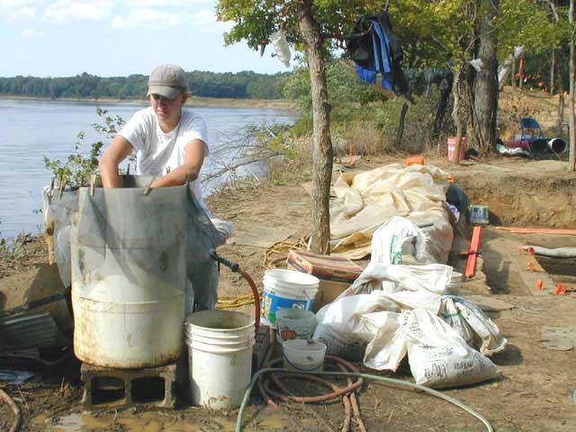 Lauren Kelly Arnold processing a flotation sample