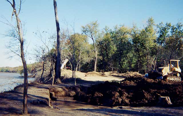 Bulldozer backfilling Blocks 1 and 2