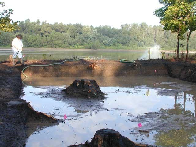 Water being pumped out of the excavation area