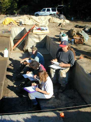  Excavators Brian Somers, Nicole Palmer, and Trish Word discuss record forms for L.9 with Staffan Peterson.