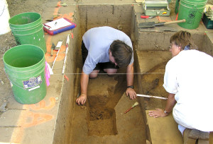 Two people excavating