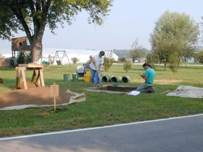 Jocelyn Turner and Rexford Garniewicz excavating block 9 which is in the plaza