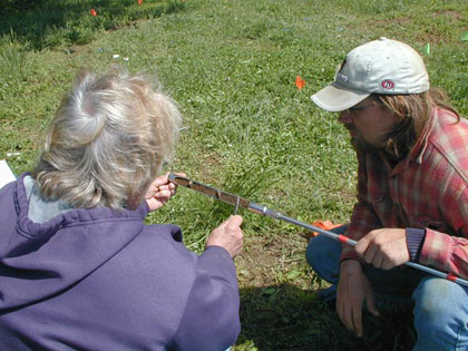 Cheryl Munson and Jon Criss reading a core sample