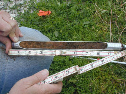 Mixed soil typical of a house wall trench found in core