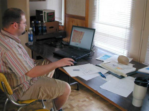 Geologist Amzie Wenning (Indiana Geological Survey) processing GPR survey data.