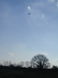 Airplane flying over site